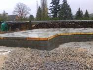 Coulage de la dalle beton pour maison ossature bois