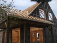 Detail de charpente sur maison en bois